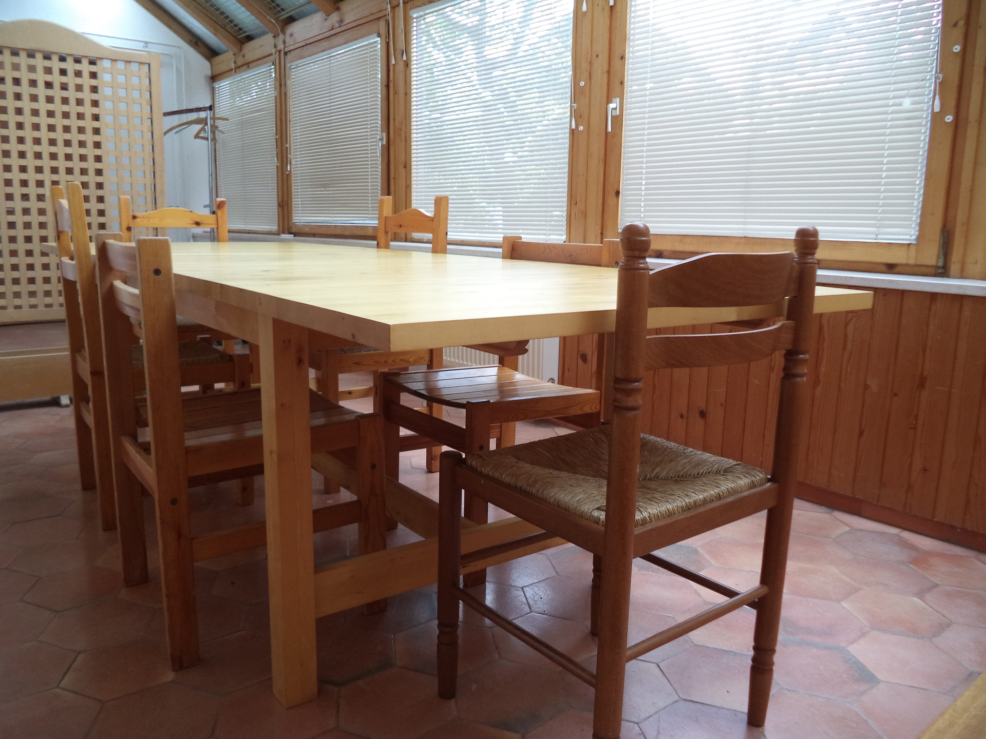 The downstairs veranda can serve as a general purpose sitting area to any guests in the house of the grand or the rustic apartment.