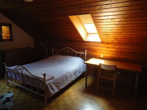 The grand bedroom bed.