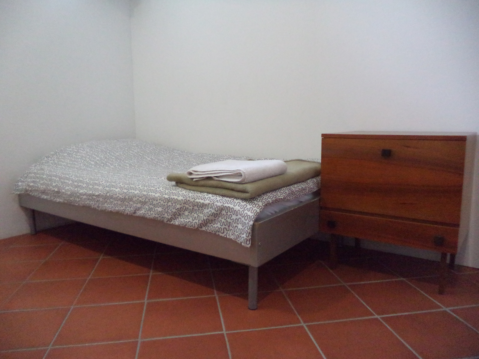 A prepared bed in the second bedroom, ready for our guests (large apartment).