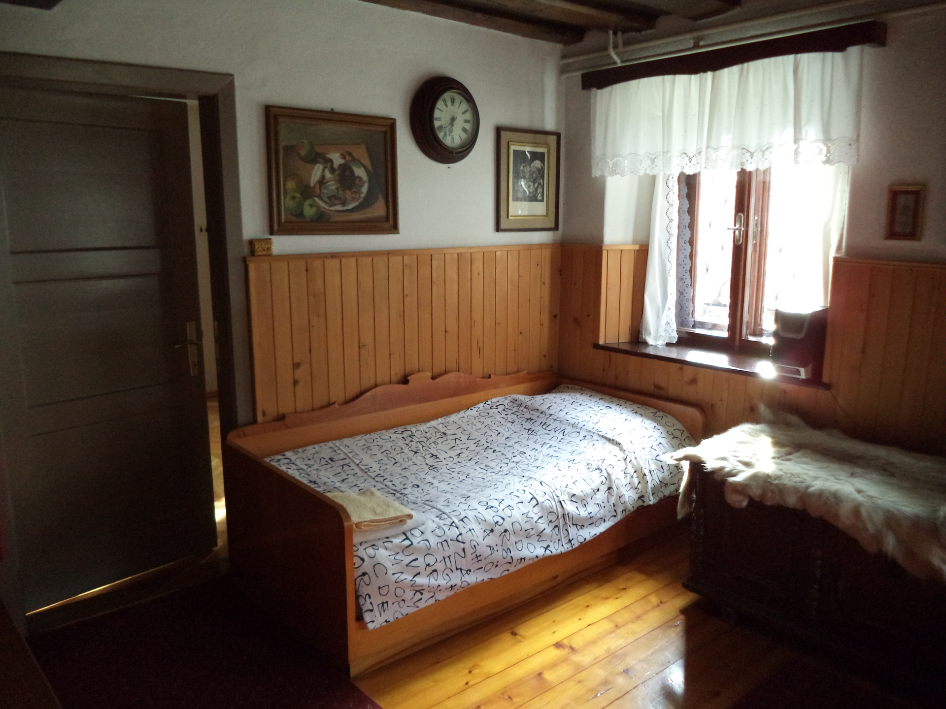 A couch can act as a bed when need be, or you could warm yourself by the stove during cold winters