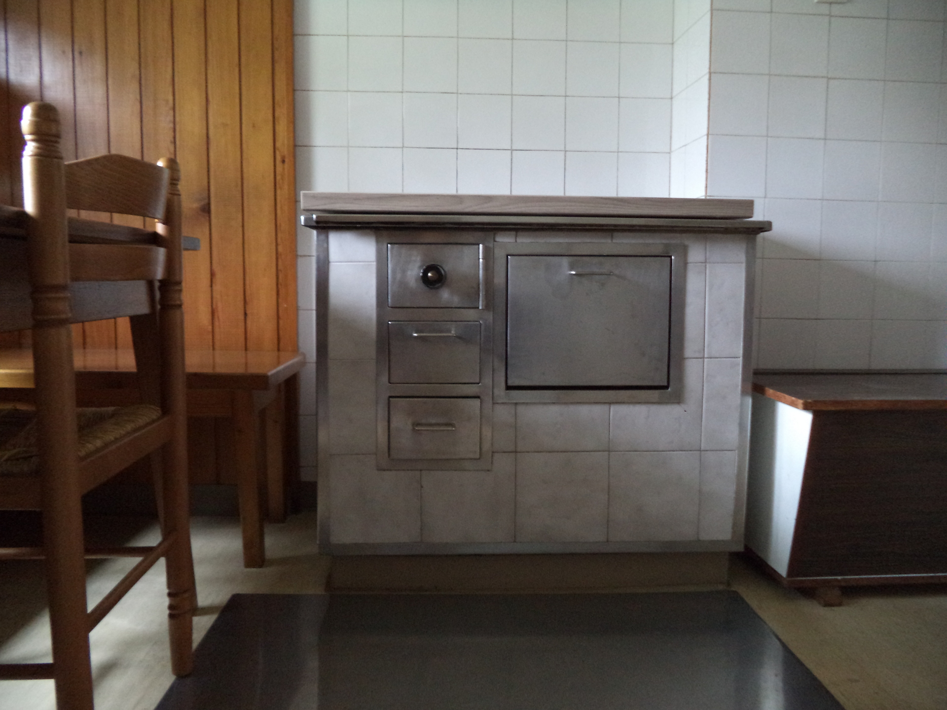 The old stove in the kitchen will heat the place up during winter time. Never fear, there is a regular stove for cooking as well (rustic apartment).